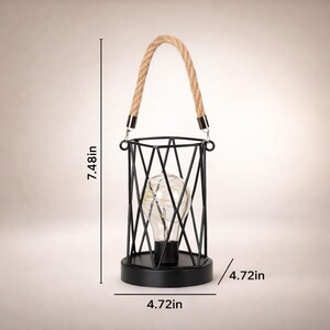 Decorative rope handle lantern lamp with geometric metal cage