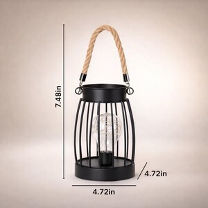 Portable metal lantern with rope handle LED candle light