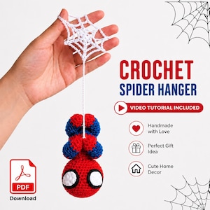 May include: A crochet spider hanger featuring a red and blue character with large white eyes, suspended from a white crocheted spider web. The text reads CROCHET SPIDER HANGER, VIDEO TUTORIAL INCLUDED, Handmade with Love, Perfect Gift Idea, Cute Home Decor.
