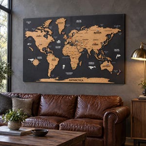May include: A large rectangular wall map featuring a dark black background with light brown cork continents. The map includes white text labels for oceans, countries, and regions, along with small decorative icons of sea creatures and a compass.