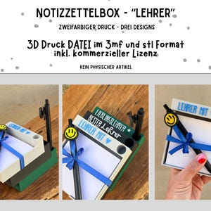 May include: A 3D-printed notepad box with the text "LEHRER" and a smiley face pen. The box is white, green, and black, with a blue ribbon. The notepad has the text "LIEBLINGSLEHRER" and "BESTER Lehrer".