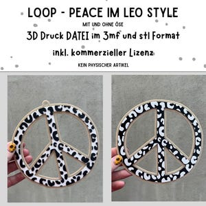 Könnte beinhalten: Ein Holz-Friedenszeichen mit Leopardenmuster. Das Friedenssymbol hat eine runde Form mit einem beigen Rand und schwarz-weißen Flecken. Das Bild enthält auch Text auf Deutsch.