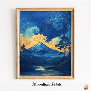 May include: Framed art print featuring a mountain landscape under a starry night sky. The artwork showcases a blue and gold color palette, with a prominent mountain peak, swirling clouds, and a reflective body of water. The text "Moonlight Prints" is at the bottom.
