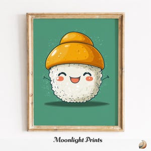 May include: A framed art print featuring a smiling sushi character with a yellow hat. The sushi has a white rice body, rosy cheeks, and outstretched arms. The background is a solid teal color. The text "Moonlight Prints" is at the bottom.