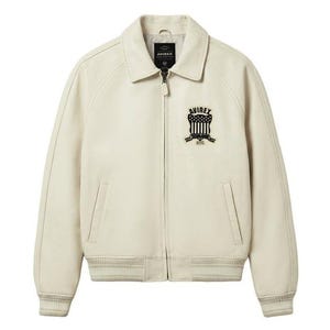 Front view of Avirex Jacket Men genuine leather varsity jacket featuring full zip closure, classic shirt-style collar, and embroidered USA crest logo on chest. This premium Men Avirex Jackets design includes ribbed white striped cuffs and hem, side pockets, and smooth leather finish inspired by Avirex signature style.
