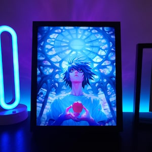 May include: Framed anime art print featuring a character with blue hair holding a red apple, set against a stained-glass window backdrop. The artwork is illuminated with blue and purple lighting, creating a vibrant and eye-catching display.