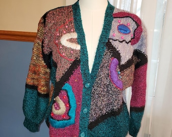 Vintage Jaclyn Smith grote veelkleurige blauwgroen damestrui met applicaties en kralen