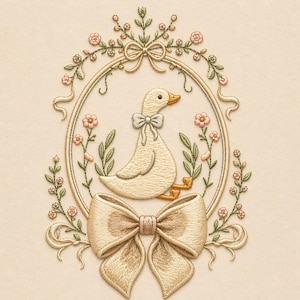 May include: Embroidered design featuring a cream-colored goose with a light blue bow, set within an oval frame. The frame is adorned with pink flowers, green leaves, and a large bow at the bottom. The design has a vintage, floral theme.