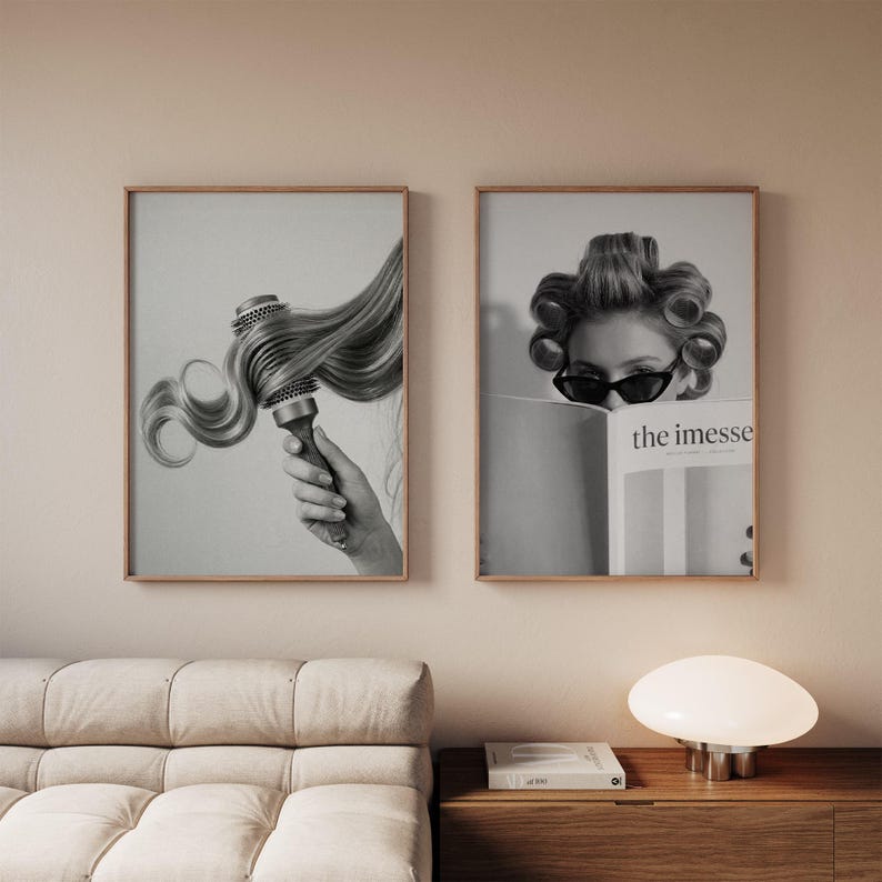May include: Two framed black and white prints. One shows a hand holding a round hairbrush with long, wavy hair. The other shows a person with hair rollers wearing sunglasses, reading a magazine with the text "the imesse".