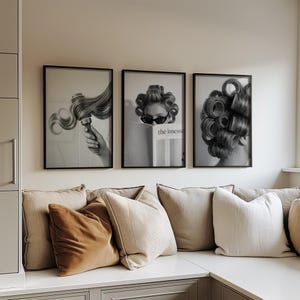 May include: A triptych of framed black and white photographs. Each features a different image related to hair styling. One shows a hand holding a curling brush, another a person with curlers and sunglasses, and the third, a head full of curlers.