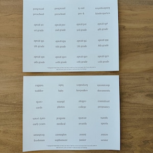 May include: Two white sheets of paper with black text. Each sheet has a grid of 12 squares. Each square contains a word related to age or life stages. The words on the top sheet are: preschool, pre-k, kindergarten, 1st grade, 2nd grade, 3rd grade, 4th grade, 5th grade, 6th grade, 7th grade, 8th grade, 9th grade, 10th grade, 11th grade, and 12th grade. The words on the bottom sheet are: toddler, baby, keepsakes, documents, cards, photos, college, pregnancy, early years, medical, awards, sports, freshman, sophomore, junior, and senior.