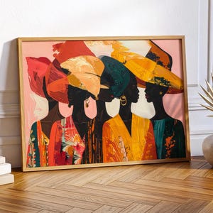 Può includere: Un dipinto astratto di cinque donne con copricapi e abiti colorati. L'opera presenta una tavolozza di tonalità rosse, arancioni, gialle e verdi, su uno sfondo rosa. Il dipinto è incorniciato in una cornice di legno marrone chiaro.