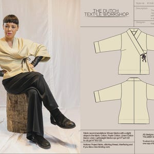 May include: A woman wearing a beige wrap jacket, black pants, and black gloves, sitting on a wooden stool. The jacket has a tie closure. A diagram of the jacket is on the right, with text "THE DUTCH TEXTILE WORKSHOP".