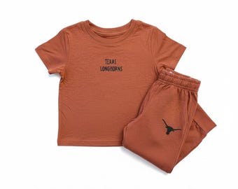 Conjunto a juego para niños pequeños de los Texas Longhorns: Conjunto gráfico de la Universidad de Texas