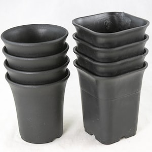 May include: A set of black plastic flower pots, one set of four round pots and one set of four square pots.