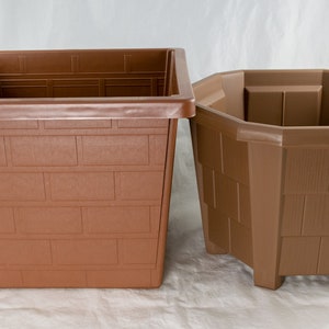 May include: Two brown plastic planters, one square and one octagonal, with a brick-like texture.