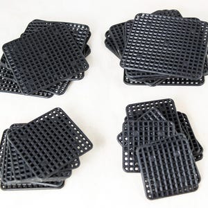 May include: A set of three ceramic mugs with a speckled, matte finish. The mugs are in shades of cream, light gray, and dark gray. Each mug has a simple, minimalist design, perfect for coffee or tea.