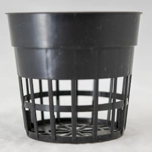 May include: A black plastic net pot with a cylindrical shape. The pot has a solid top section and a grid-like structure for the sides and bottom. Ideal for hydroponics and soilless gardening.