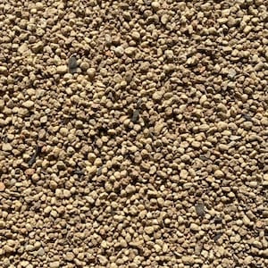 K&ouml;nnte beinhalten: Nahaufnahme einer strukturierten Oberfl&auml;che, die mit kleinen, hellbraunen und beigefarbenen Kieselsteinen bedeckt ist. Die Kieselsteine sind in verschiedenen Gr&ouml;&szlig;en und Formen vorhanden und erzeugen ein nat&uuml;rliches und erdiges Aussehen.