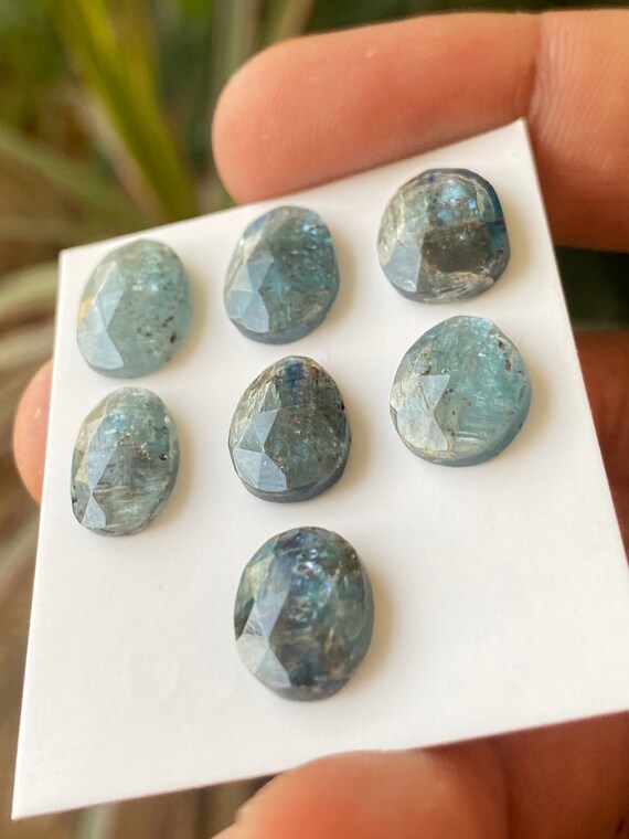 Stunning rare moss green kyanite pear rosecut flats fine quality weight 53 carats size 10.1x5.7mm-18.3x7.4mm pcs 17 moss green rosecut Stunning rare moss green kyanite pear rosecut flats fine quality weight 53 carats size 10.1x5.7mm-18.3x7.4mm pcs 17 moss green rosecut