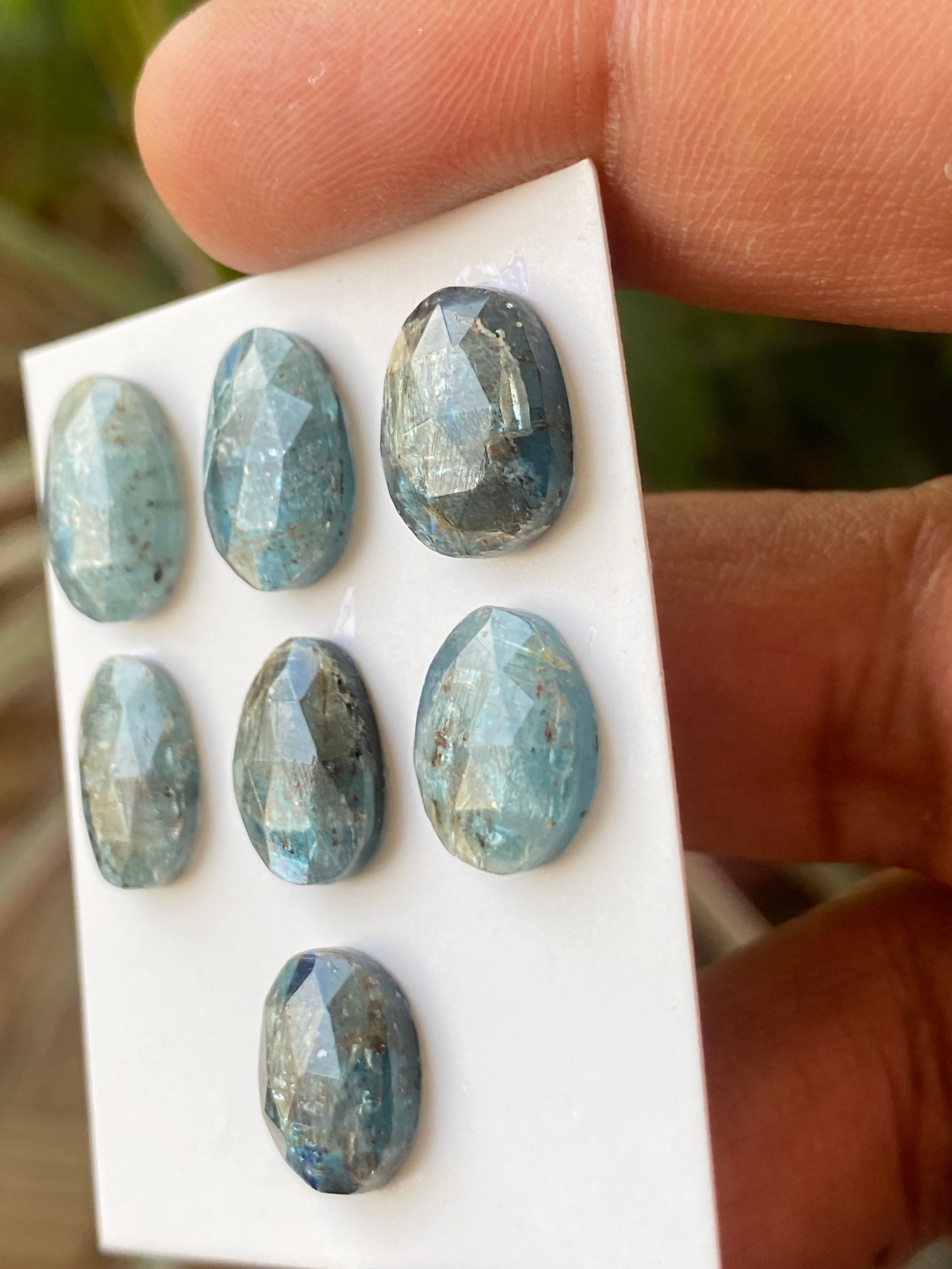 Stunning rare moss green kyanite pear rosecut flats fine quality weight 53 carats size 10.1x5.7mm-18.3x7.4mm pcs 17 moss green rosecut Stunning rare moss green kyanite pear rosecut flats fine quality weight 53 carats size 10.1x5.7mm-18.3x7.4mm pcs 17 moss green rosecut