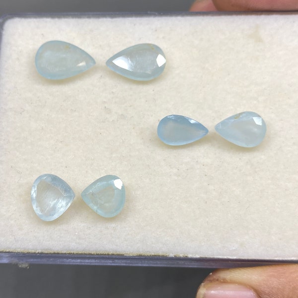 Rare Aquamarine cutstone unmatched pair fine quality pcs 6 wt 12 carats size 9mm-13x9mm eye catching designs fine cutting size wt