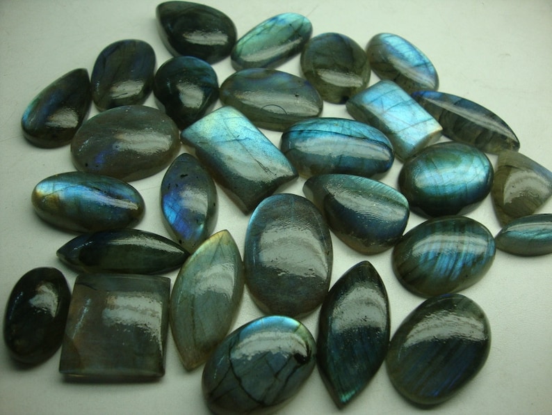 Labradorite Blue Cabochons Very Rare flashy blue fire Wt 587 cts Pcs 28 huge size Wholesale price Good Sizes Mix shapes Ovals Pears