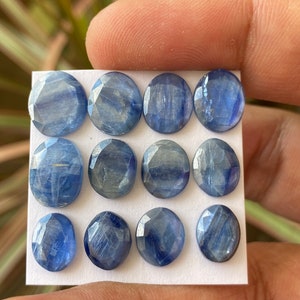 Stunning rare moss green kyanite pear rosecut flats fine quality weight 53 carats size 10.1x5.7mm-18.3x7.4mm pcs 17 moss green rosecut Stunning rare moss green kyanite pear rosecut flats fine quality weight 53 carats size 10.1x5.7mm-18.3x7.4mm pcs 17 moss green rosecut