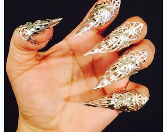 10 pcs;Spike claw rings,nail tips,nail rings,claws,claw rings, nailguards, nail rings,silver color,sizable.