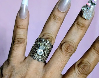 Spider ring in silver color filigree metal and a jet black Swarovski Crystal.