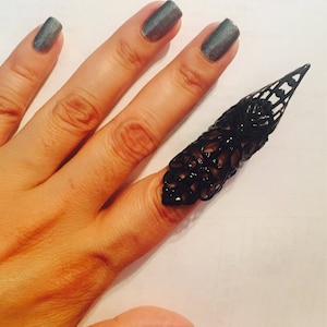 Iron claw ring,nail guard,nail tip,metal claw,metal spike claw, metal nail guard,finger cover,metal nail guard,thumb ring,thumb claw.