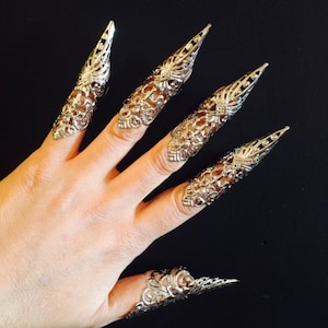 Silver claws rings,set of 5pcs.adjustable.