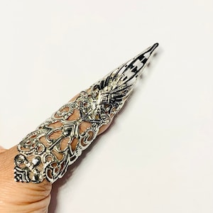 claw ring,nail guard,metal claw,finger tip,thumb claw,metal nail cover,finger cover,thumb ring,adjustable.