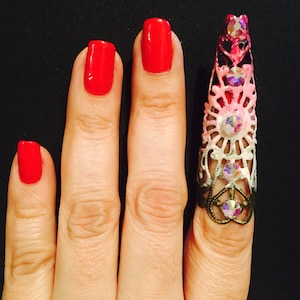 Nail guard, nail ring, claw ring, metal claw, nail claw, nail cover, metal finger cover. Metal claw.