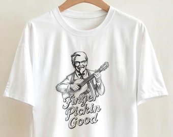おもしろいフライドチキンギタリストTシャツ｜フィンガーピッキングが上手な音楽好きへのギフト｜ハンドメイドグラフィックTシャツ