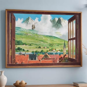 May include: A framed artwork depicting a scenic landscape viewed through an open window. The artwork features a vibrant green hillside, snow-capped mountains, and a town with red-tiled roofs. A ship sails in the sky, adding a whimsical touch to the scene.