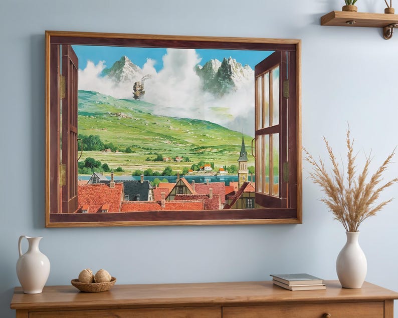 May include: A framed artwork depicting a scenic landscape viewed through an open window. The artwork features a vibrant green hillside, snow-capped mountains, and a town with red-tiled roofs. A ship sails in the sky, adding a whimsical touch to the scene.