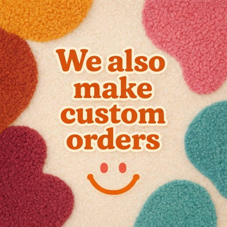 May include: A cream-colored textured background featuring irregular, fuzzy patches in orange, pink, maroon, and teal. Centered text in bold orange letters reads "We also make custom orders" above a simple orange smiling face graphic.