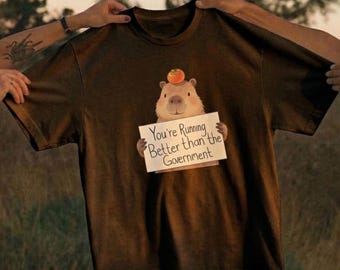 Camiseta engraçada com meme de capivara para corrida, camiseta com estampa de frase, presente para maratonista, camiseta de treino com tema animal