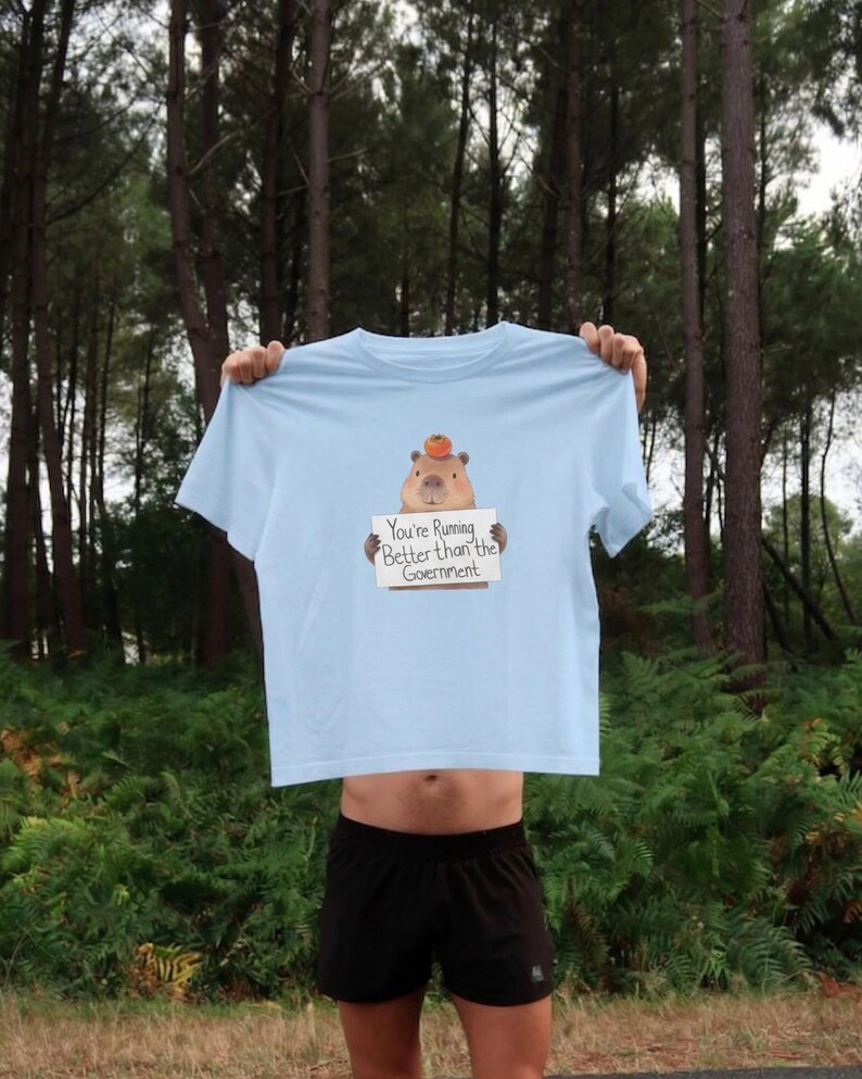 Funny capybara meme running shirt sarcastic quote graphic tee marathon runner gift cute animal workout t-shirt better than government
