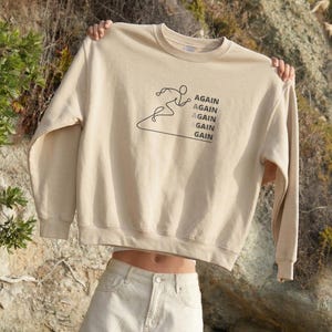 Minimalistisk sportig löpartröja med motivation, bekväm unisex, tung blandning av träningskläder och inspirerande sportkläder med rund hals.