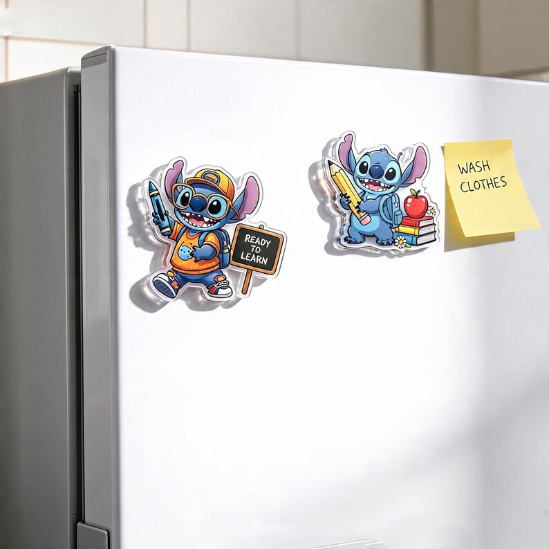May include: Two acrylic magnets featuring the blue character Stitch. One magnet shows Stitch wearing a yellow cap and glasses, holding a blue crayon next to a sign that reads READY TO LEARN. The other shows Stitch holding a yellow pencil near books and an apple.