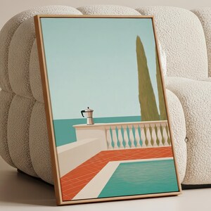 May include: A framed art print depicting a serene poolside scene. The artwork features a turquoise pool, a white balustrade, and a silver coffee maker. The color palette includes shades of blue, orange, and green, creating a calming aesthetic. The print is leaning against a cream-colored sofa.