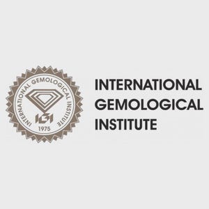 Könnte beinhalten: Das Logo des International Gemological Institute zeigt ein kreisförmiges Siegel mit gezacktem Rand, das ein Diamantsymbol und den Text IGI 1975 enthält. Rechts daneben sind die Worte International Gemological Institute in Schwarz gedruckt.