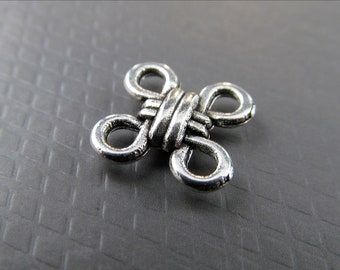 20 x Connector Celtic Knot with four eyelets - VB10