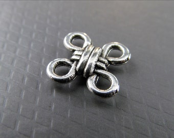 20 x Connector Celtic knot with four eyelets - VB10