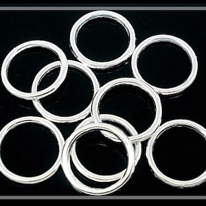 20, 50 eller 100 x Försilvrade slutna hoppringar 12 mm R310G