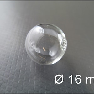 May include: A clear glass sphere with a diameter of 16 mm. The sphere has a few small air bubbles inside.