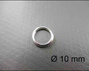 May include: Silver jump ring with a diameter of 10 mm.