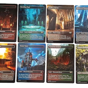 Könnte beinhalten: Zehn Magic: The Gathering Sammelkarten mit verschiedenen Landschaften. Karten enthalten "Blood Crypt", "Breeding Pool", "Godless Shrine", "Hallowed Fountain", "Overgrown Tomb", "Sacred Foundry", "Steam Vents", "Stomping Ground", "Temple Garden" und "Watery Grave".